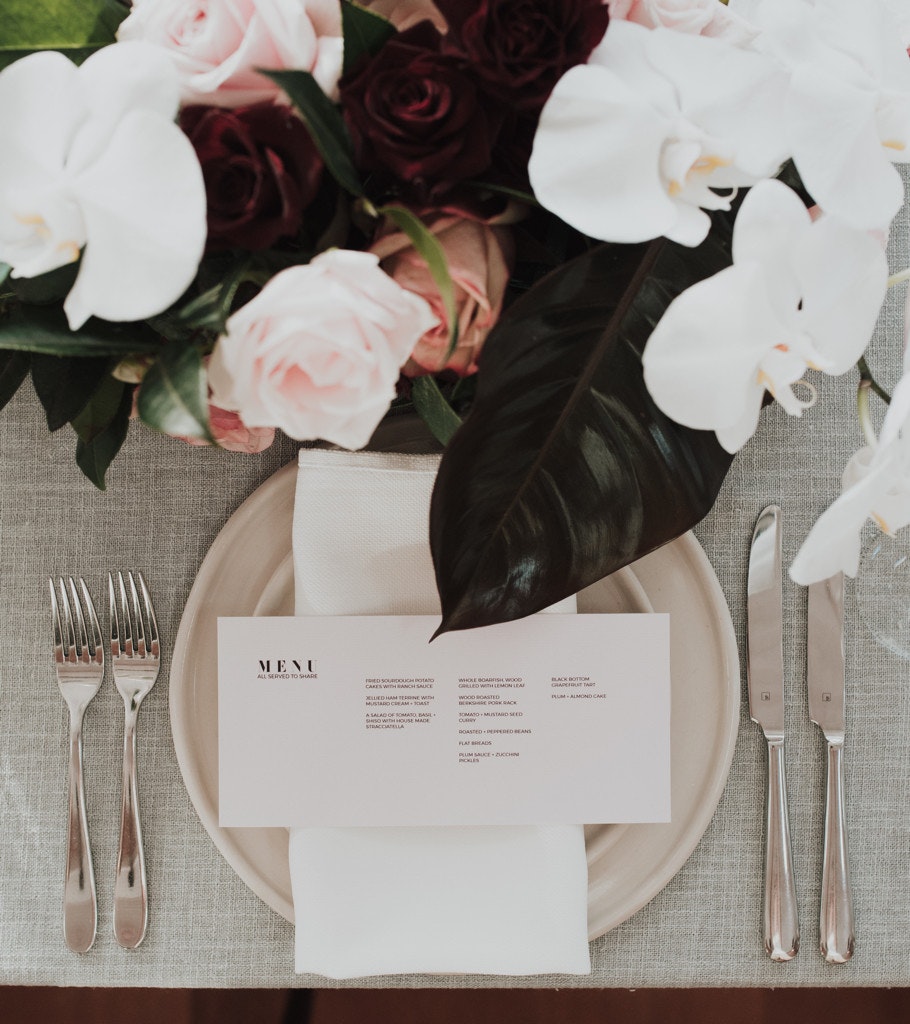 Place setting styled for a wedding reception.